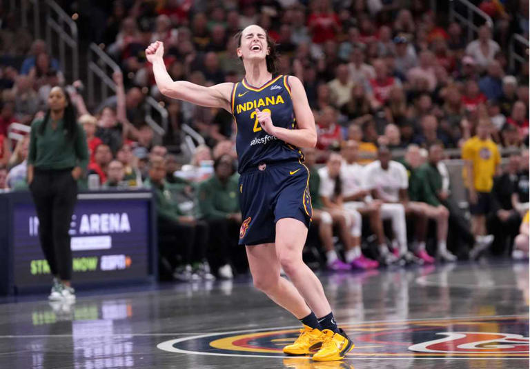 Indiana Fever guard Caitlin Clark (22) reacts as she misses a three-point field goal during the second half of a game against the Seattle Storm on Sunday, Aug. 18, 2024, at Gainbridge Fieldhouse in Indianapolis. © Christine Tannous/IndyStar / USA TODAY NETWORK