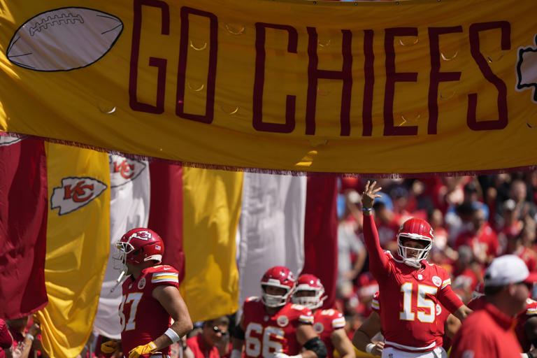 Kansas City Chiefs quarterback Patrick Mahomes (15) runs onto the field before an NFL preseason football game against the Detroit Lions Saturday, Aug. 17, 2024, in Kansas City, Mo. (AP Photo/Charlie Riedel)