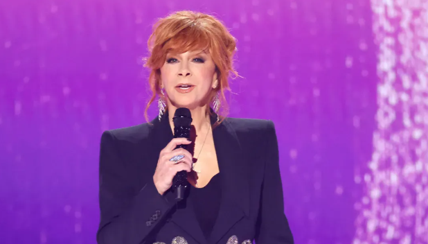 Reba McEntire disclosed that she encountered an “unexplained illness” during her time as a mentor on The Voice, which led to her decision to depart from the show.